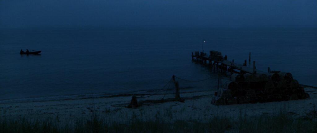 Charlie and Denherder arrive by sea to the dock.